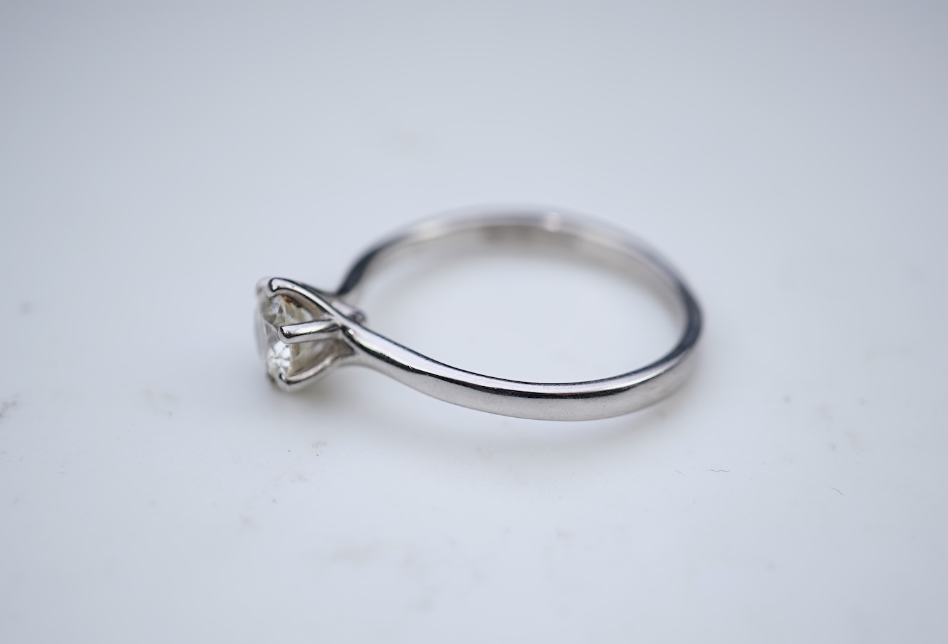 A diamond solitaire ring